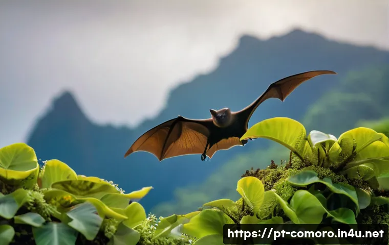 코모로 동물 보호 구역 - "A majestic Livingstone's fruit bat, with its impressive wings slightly spread, is perched on a thic...